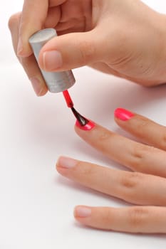 Painting nails with pink color