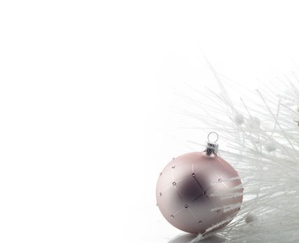 Christmas decoration with ball ornament over white background