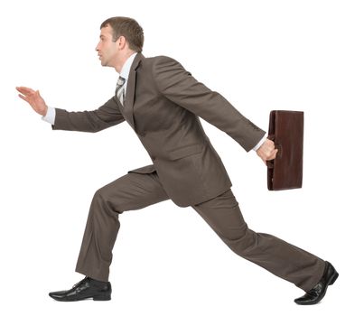 Businessman running forward on isolated white background, side view