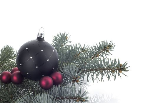 Christmas decoration with ball ornaments over white background