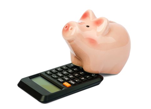 Piggy bank with calculator on isolated white background