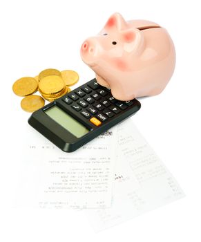 Piggy bank with coins and bills on isolated white background