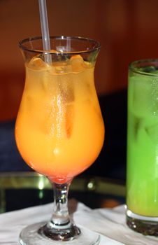 Alcoholic orange cocktail at the bar