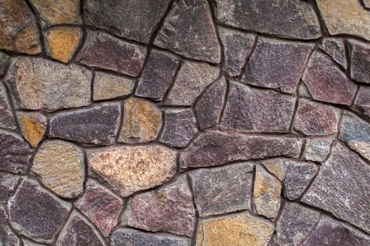 Stone background and wall from a natural stone