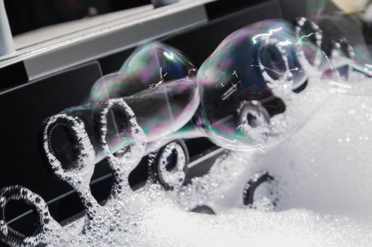 process of production by car of soap bubbles with foam