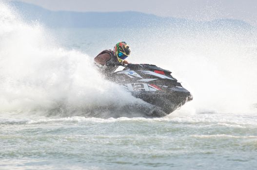 Pattaya, Thailand - December 6, 2015: Yousef al Abduleazzaq from Kuwait competing in the Pro Runabout Class of the International Jet Ski World Cup at Jomtien Beach, Pattaya, Thailand.