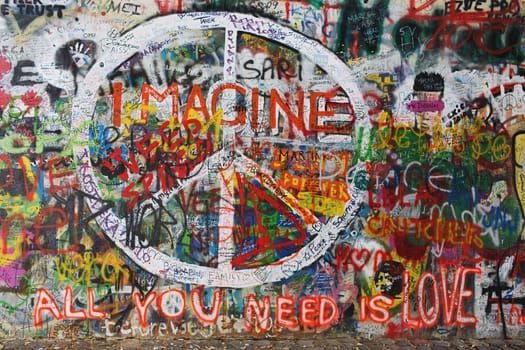 Colourfull graffiti on wall with peace sign