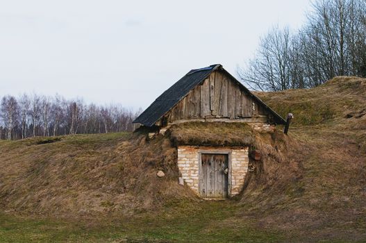 Old house in ground in autumn ешьу