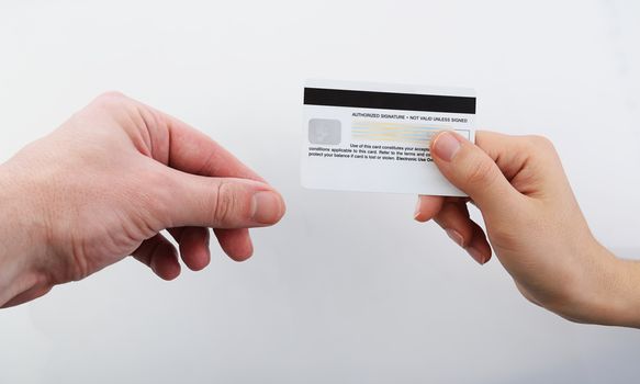 Buying with credit card on white background