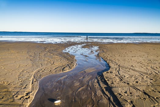 Sandy beach at sunset in Maine, USA