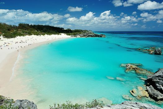 People on vacation in Pink Sand beach Bermuda