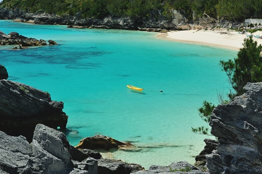 Yellow kayak in blue bay in Bermuda islands