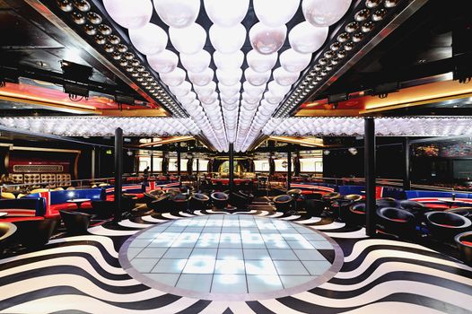 empty disco floor and lounge with bright ceiling