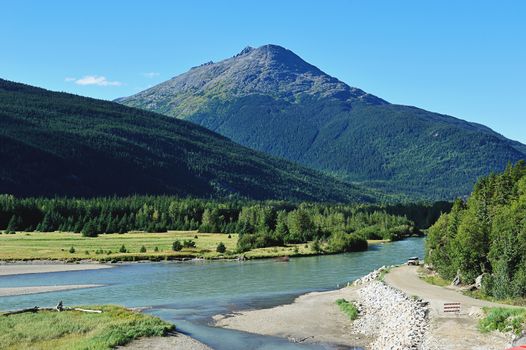 road next rocs and meadow in Alaska