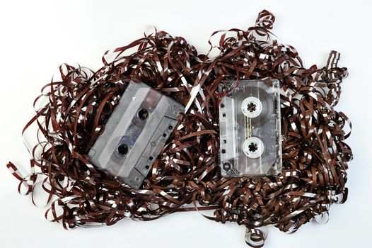 Audio tape on white backdrope with casette on top