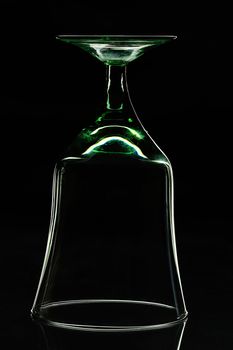 silhouette of glass on a black background upside down