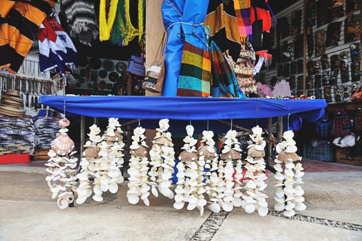 Selling colourful shells souvenirs in touristic place