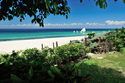 exit on blue beach with white sand