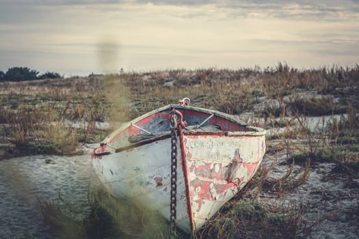 An old rowboat sits on a beach near Port Townsend, Washington ,USA