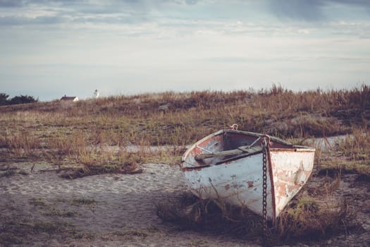 An old rowboat sits on a beach near Port Townsend, Washington ,USA