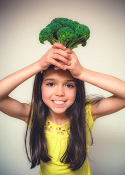 Young girl with borwn hair acts in studio.