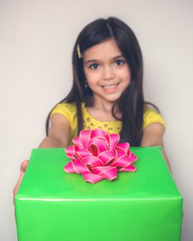 Young girl with borwn hair acts in studio.