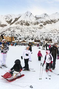 PONTE DI LEGNO, Italy - December 25: Families on holiday on the slopes of the Italian Alps on Thursday, December 25, 2014.