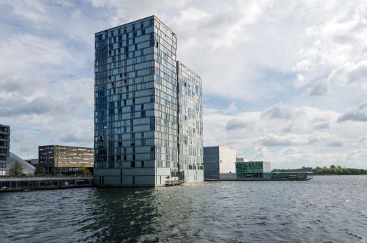 Modern buildings around Weer water in Almere Stad, Netherlands 