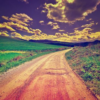 Dirt Road Leading to the Farmhouse in Tuscany, Italy at Sunset, Instagram Effect