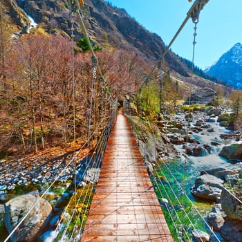 Cable-Stayed Bridge across Mountain Stream in the Italian Alps, Piedmont