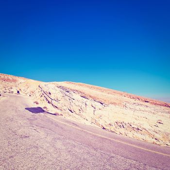 Winding Asphalt Road in the Negev Desert in Israel, Instagram Effect