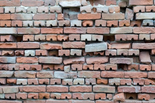 Detail of old and abandoned brick wall