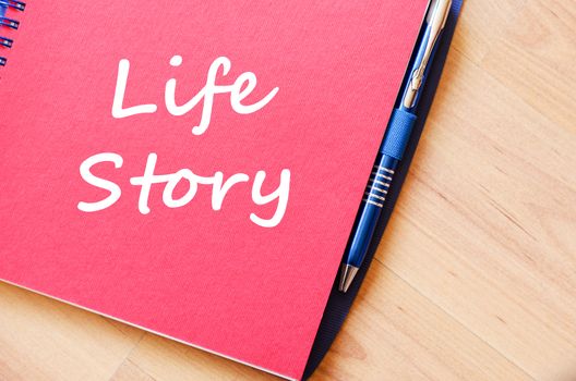Life story text concept write on notebook with pen