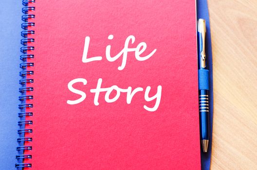 Life story text concept write on notebook with pen