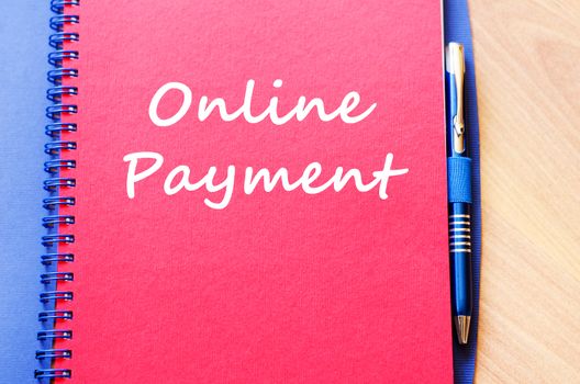 Online payment text concept write on notebook with pen