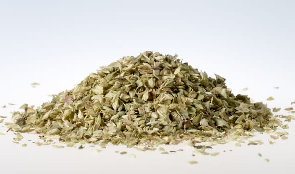 Pile of Dried Oregano with white background. Macro Image.