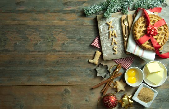 Christmas baking ingredients with background space