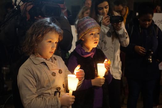 ENGLAND, London: People in support of the refugees gathered in London on December 12, 2015 to hold a Christmas vigil outside Downing Street.The demonstrators held candles and signs calling for refugees to be welcomed.