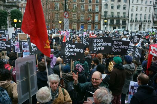 ENGLAND, London: Thousands of people gathered in London on December 12, 2015, to call for an end to the UK's bombing in Syria.Demonstrators marched to Downing Street to call for an immediate halt to air strikes in the war-ravaged country.