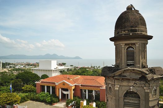 Cathedral old tower in Managua with city and lake in background