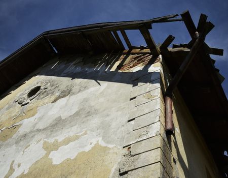 bottom view of the ramshackle roof of the old house