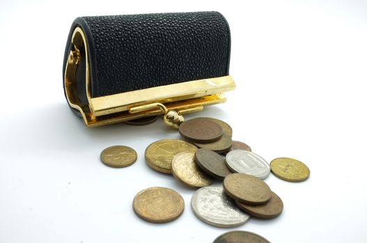 International coins and black wallet, pocket