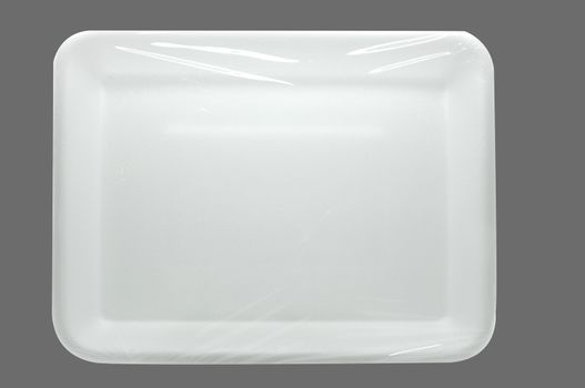 Wrapped white styrofoam food tray