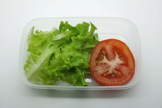 Fresh tomatoes and lettuce