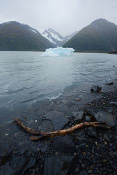 blue iceberg from portage glacier in alaska
