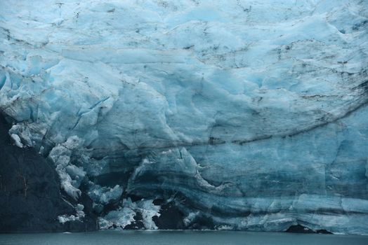 blue ice of portage glacier in alaska
