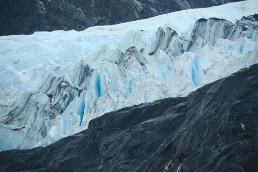 blue ice of portage glacier in alaska
