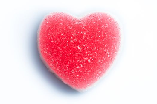 sugar heart shaped candy on white background