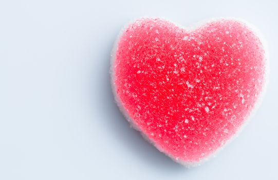 sugar heart shaped candy on white background