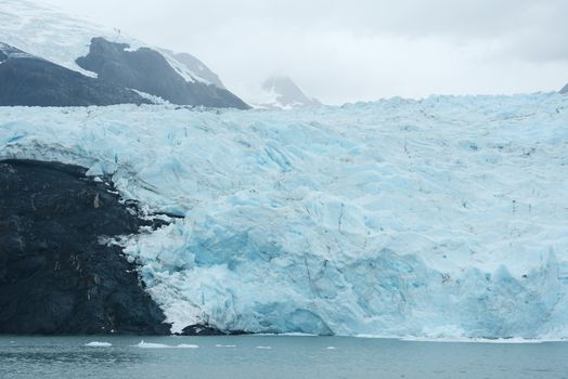 blue ice of portage glacier in alaska
